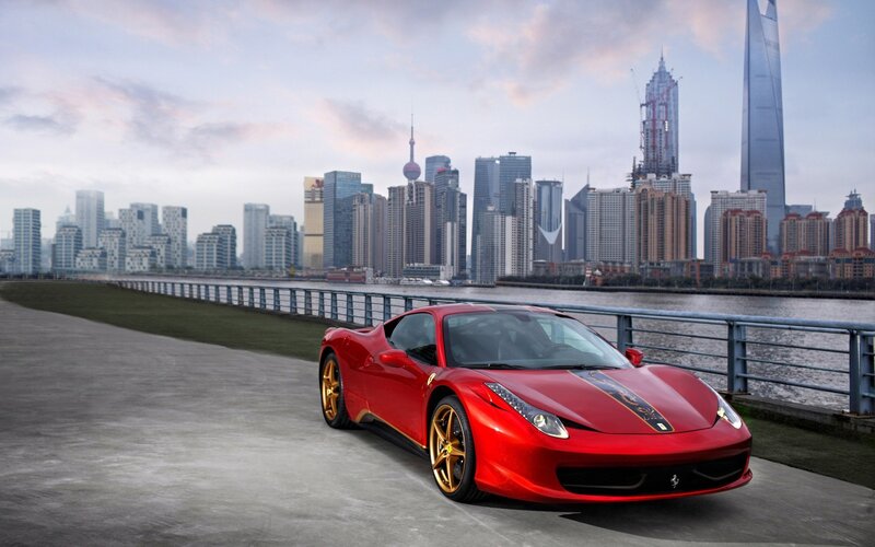 Red Ferrari Sports Car — Cityscape