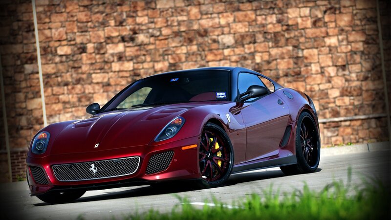 Red Ferrari Sports Car — Dramatic, Afternoon, Photograph, Brick Wall, Grass