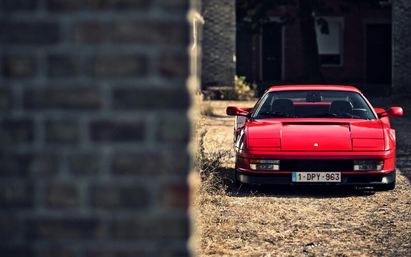 Red Ferrari Sports Car — Dramatic, Afternoon, Photograph, Brick Wall