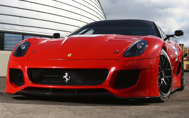 Red Ferrari Sports Car — Dramatic, Afternoon, Photograph, Building