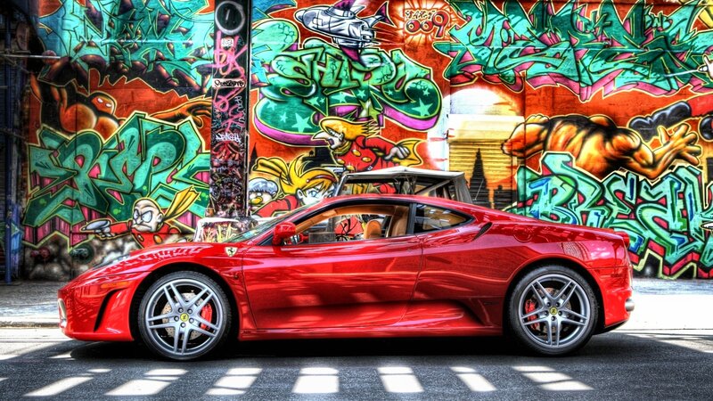 Red Ferrari Sports Car — Dramatic, Afternoon, Photograph, Graffiti Wall