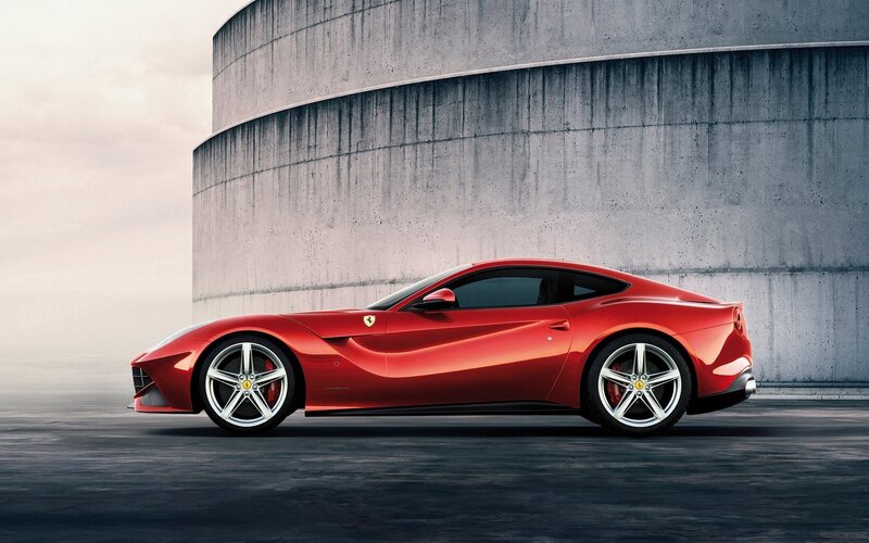 Red Ferrari Sports Car — Dramatic, Photograph, Concrete Wall, Asphalt