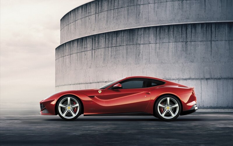 Red Ferrari Sports Car — Dramatic, Photograph, Concrete Wall, Sky, Gray