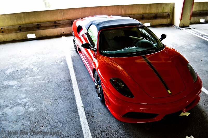 Red Ferrari Sports Car — Dramatic, Photograph, Parking Garage, Concrete Wall