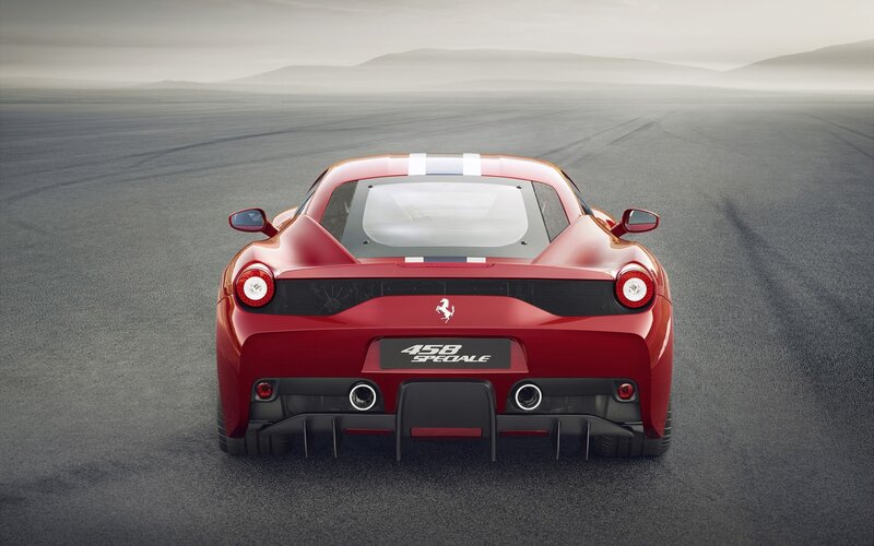 Red Ferrari Sports Car — Dramatic, Photograph, Race Track, Mountains, Rear View