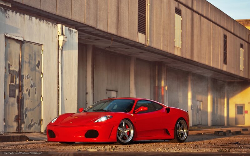 Red Ferrari Sports Car — Dramatic, Sunset, Photograph, Building, Garage Doors