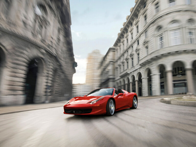 Red Ferrari Sports Car — Dynamic, Afternoon, Photograph, Building