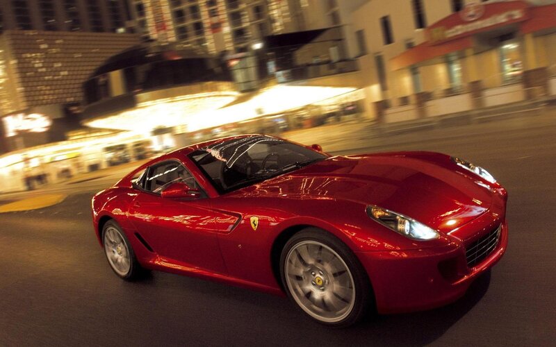 Red Ferrari Sports Car — Dynamic, Night, Photograph, City Street, Buildings, Black, White