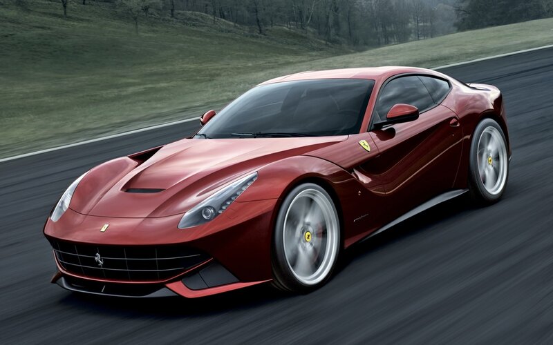 Red Ferrari Sports Car — Dynamic, Photograph, Race Track, Hills, Trees