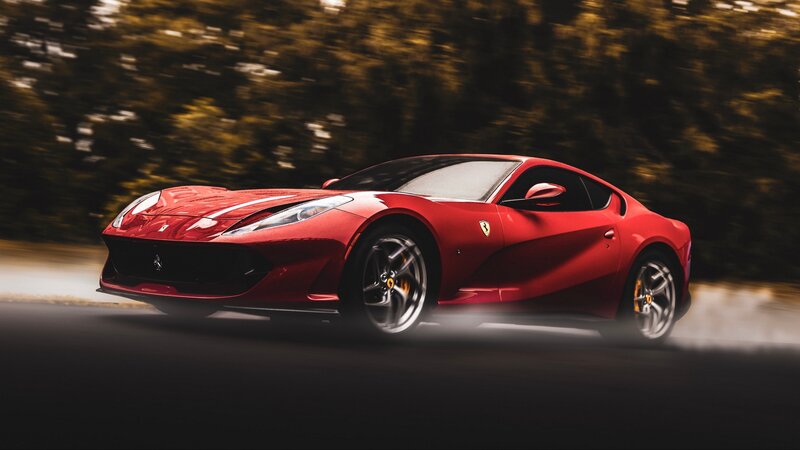 Red Ferrari Sports Car — Dynamic, Photograph, Road, Trees