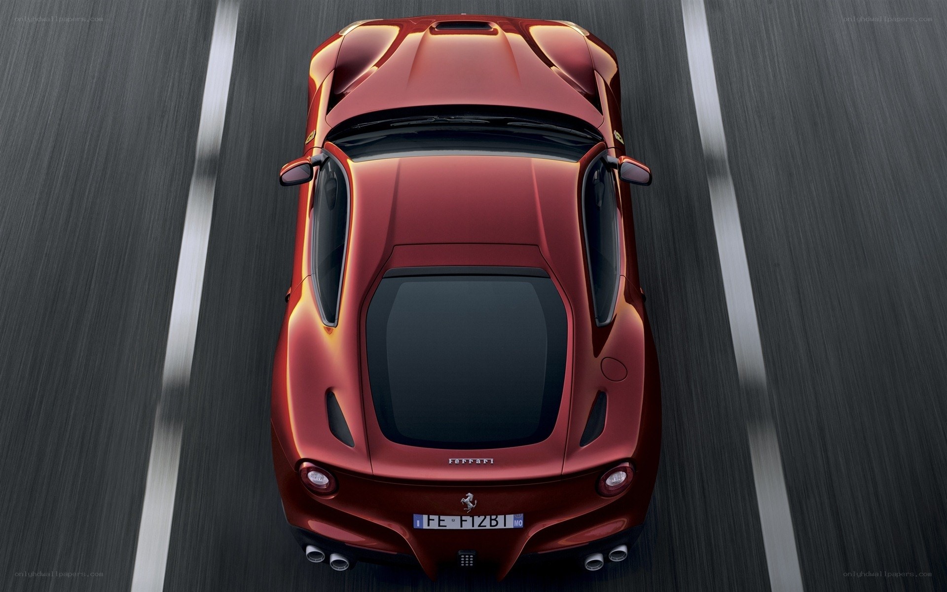 Red Ferrari sports car in motion