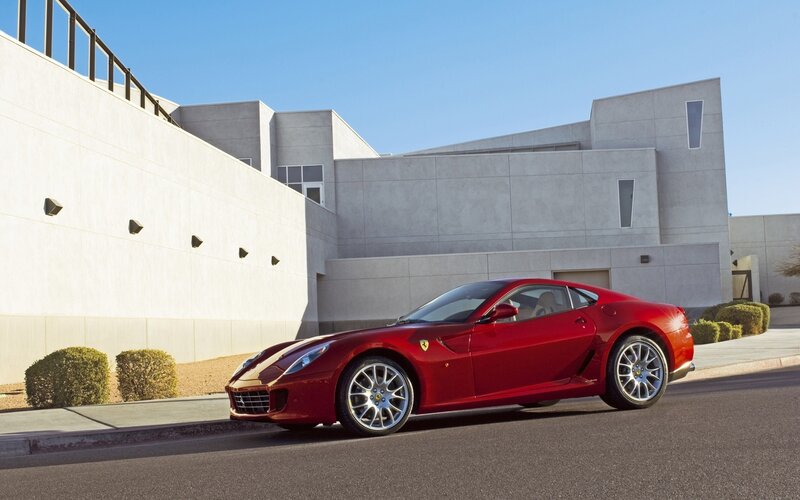 Red Ferrari sports car parked