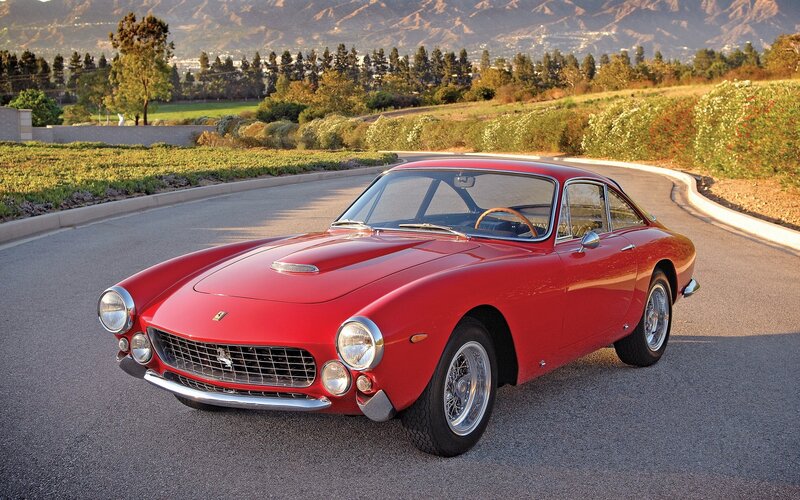 Red Ferrari Sports Car — Serene, Sunset, Photograph, Road, Mountains