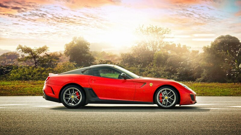 Red Ferrari Sports Car — Serene, Sunset
