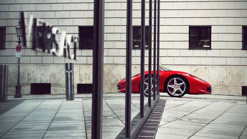 Red Ferrari Sports Car — Urban, Afternoon, Photograph, Building, Street Lamp