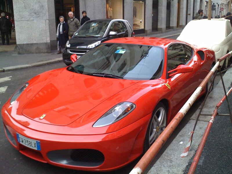 Red Ferrari Sports Car — Urban