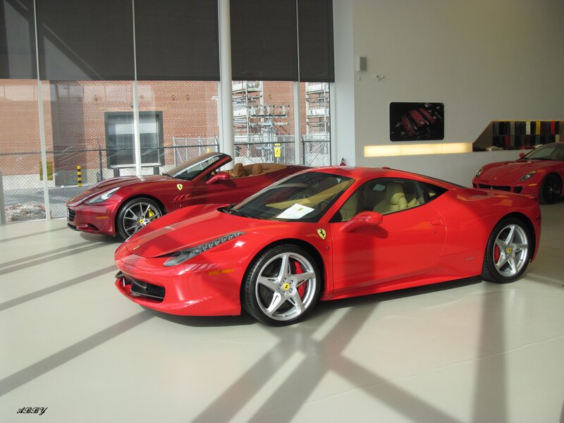 Red Ferrari Sports Cars — Clean, Bright