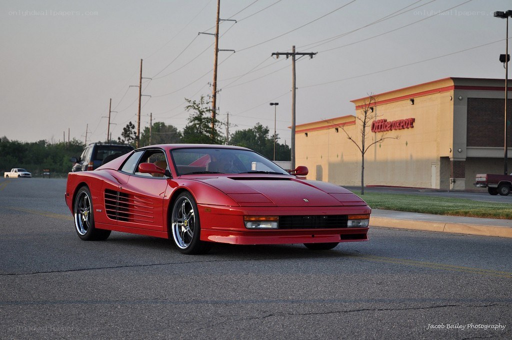 Red Ferrari Testarossa on street