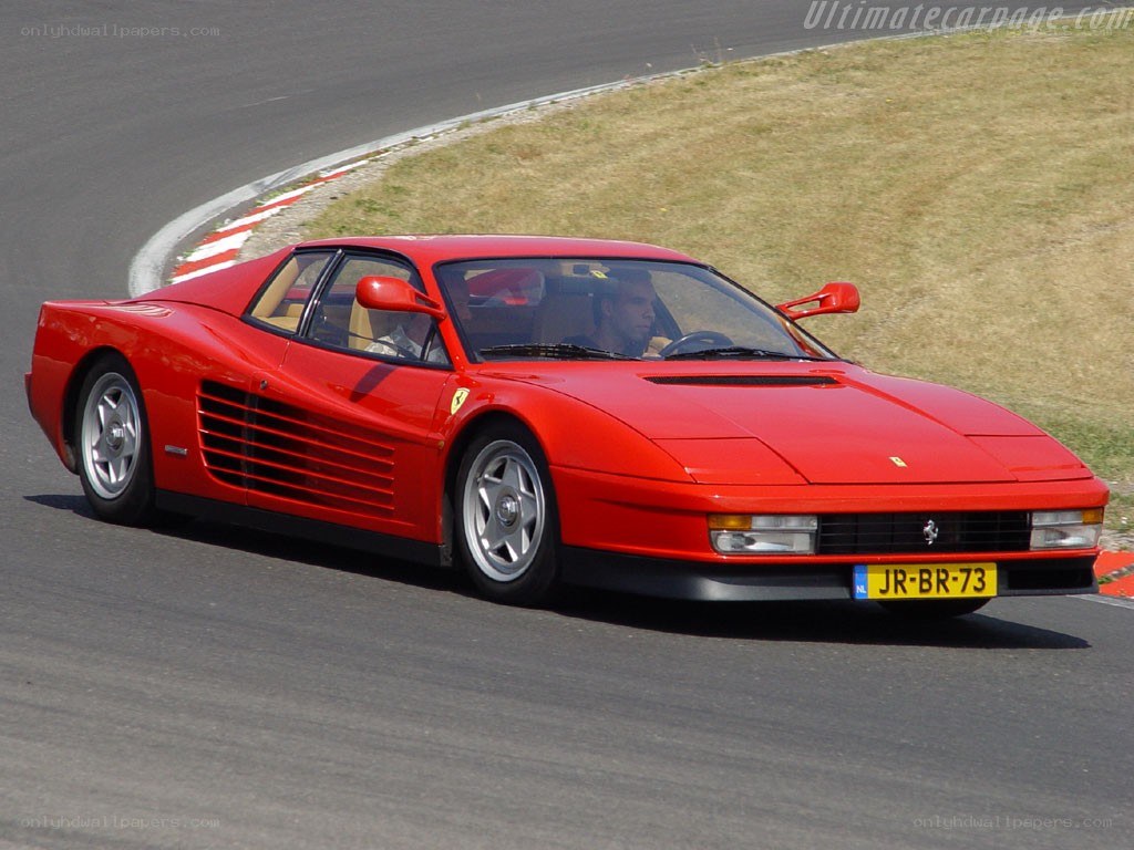 Red Ferrari Testarossa on track