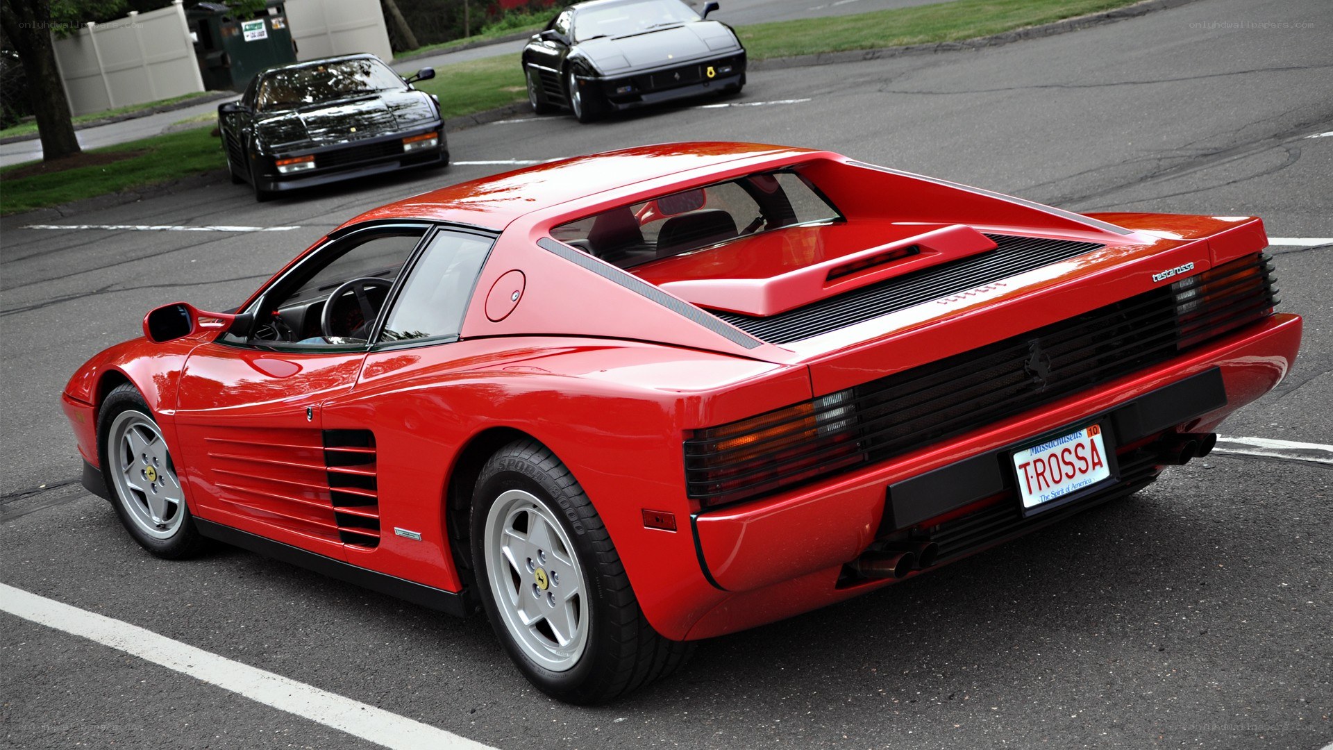 Red Ferrari Testarossa parked