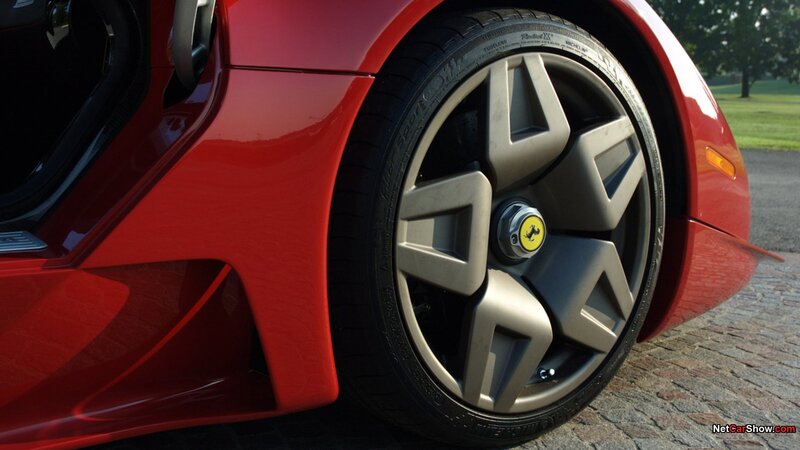 Red Ferrari Wheel — Dramatic, Afternoon, Photograph, Car