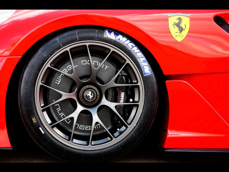 Red Ferrari Wheel — Dramatic, Photograph, Tire, Brake
