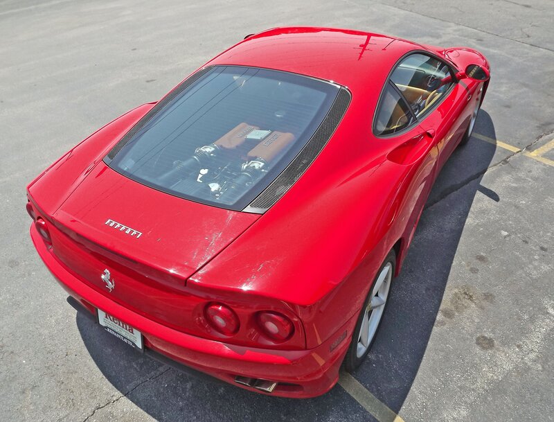 Red Ferrari with engine view