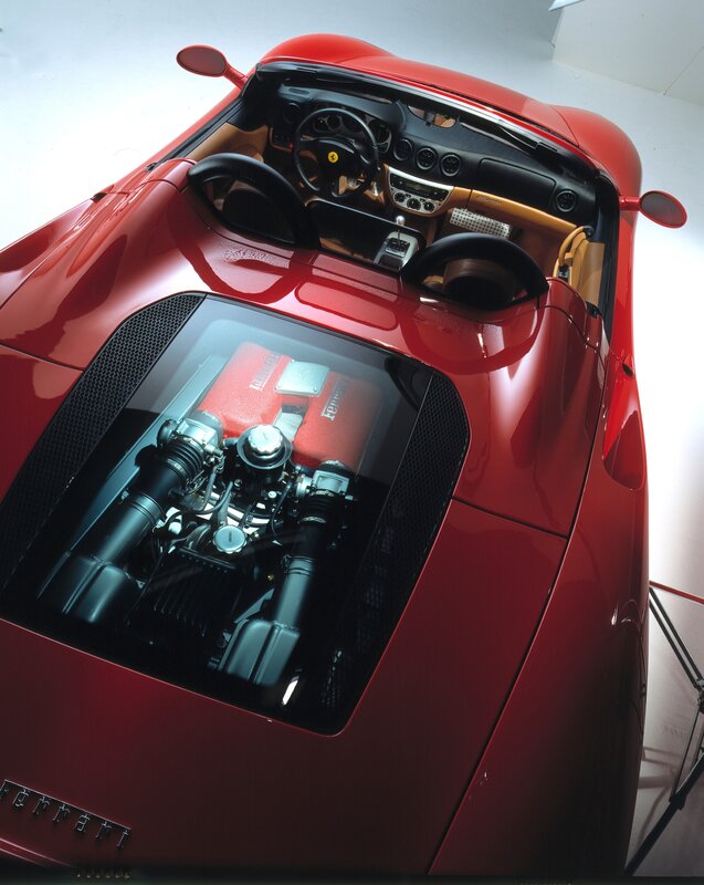 Red Ferrari with engine view