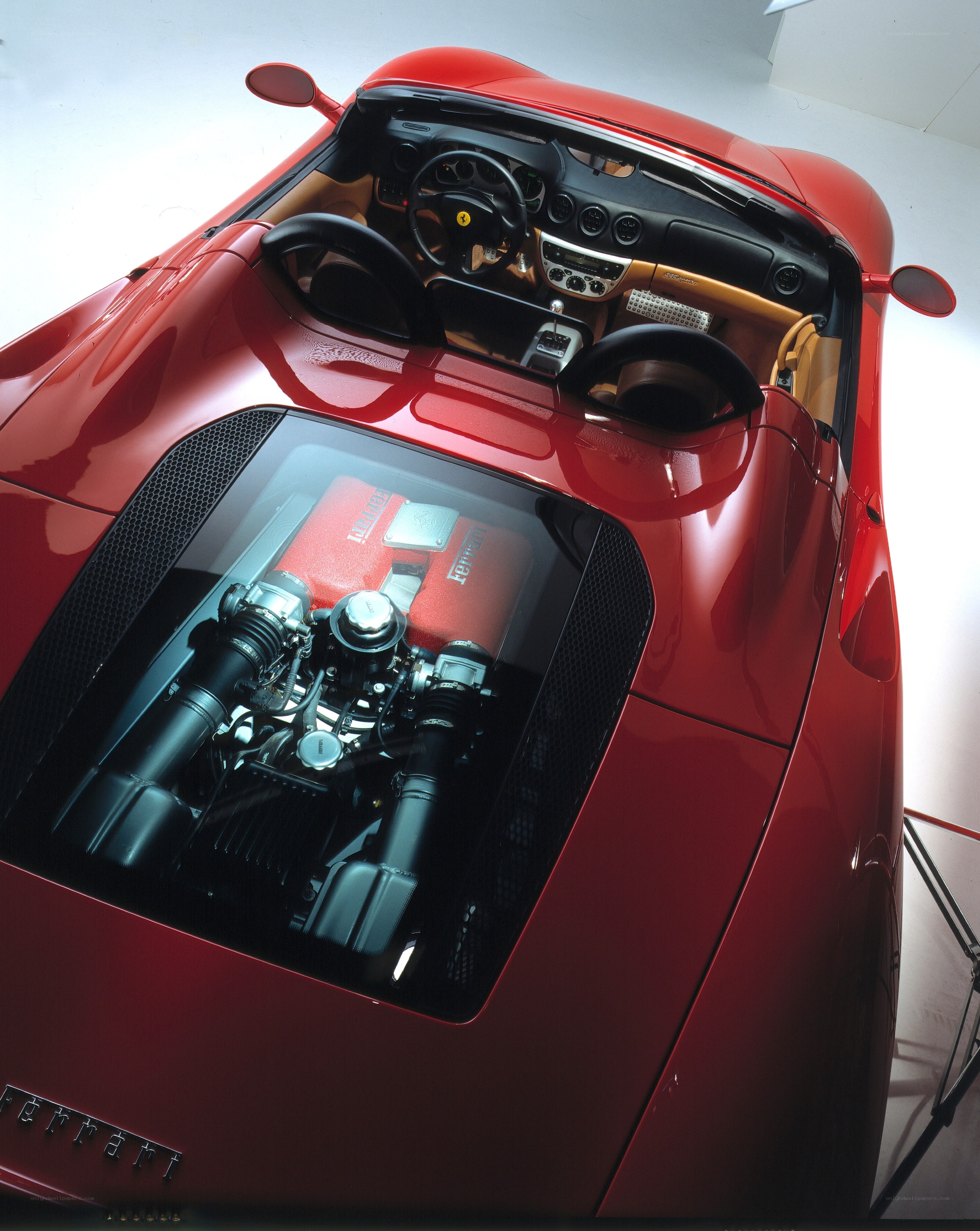 Red Ferrari with engine view