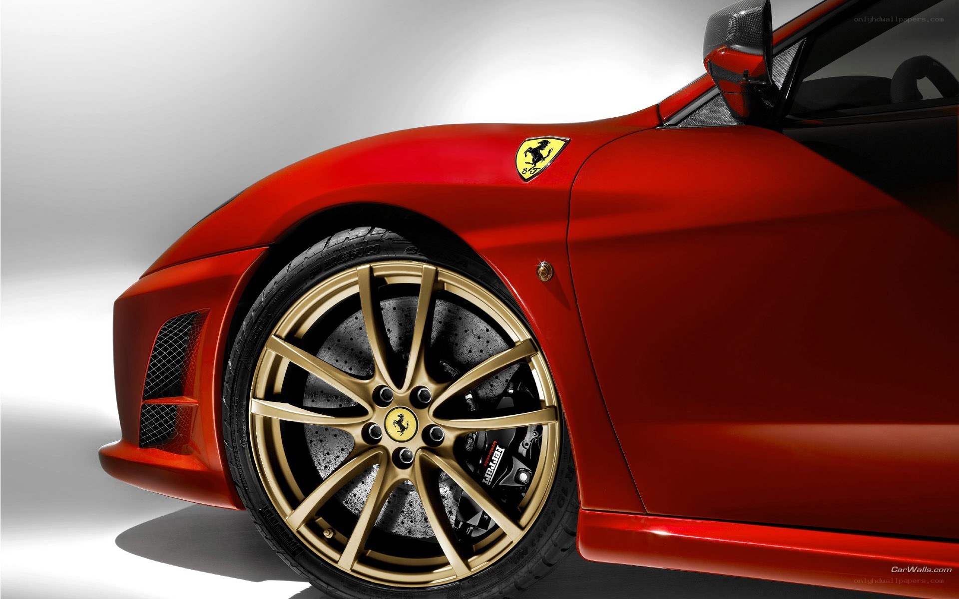 Red Ferrari with gold wheels