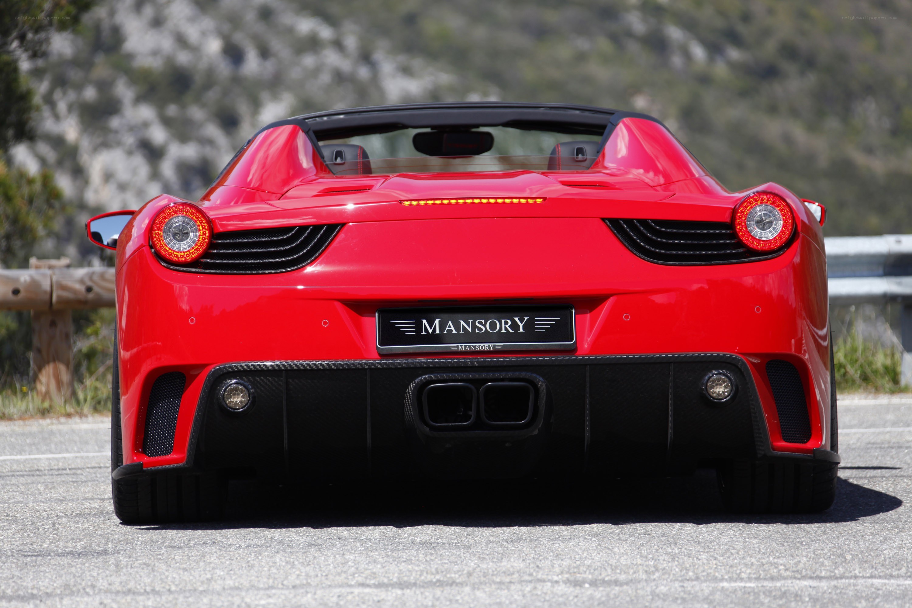 Red Ferrari with Mansory tuning
