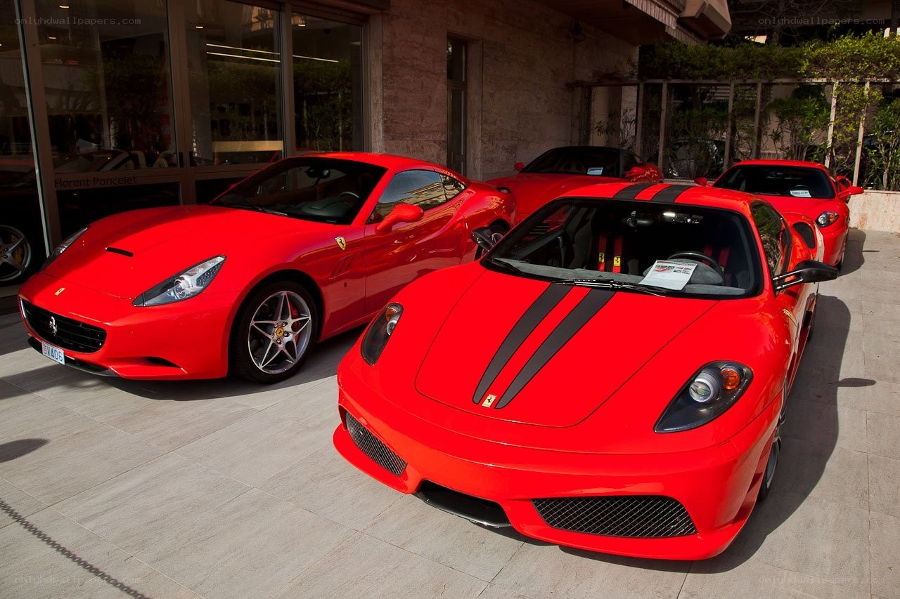 Red Ferraris at a dealership