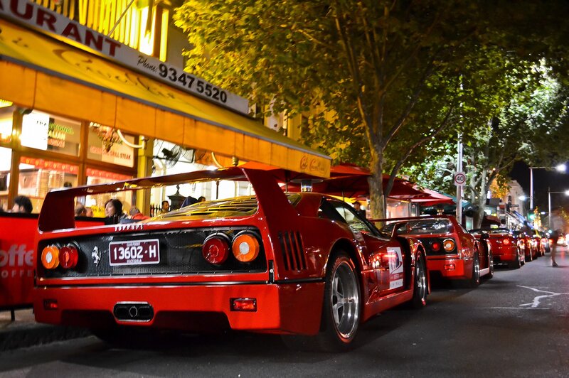 Red Ferraris at night