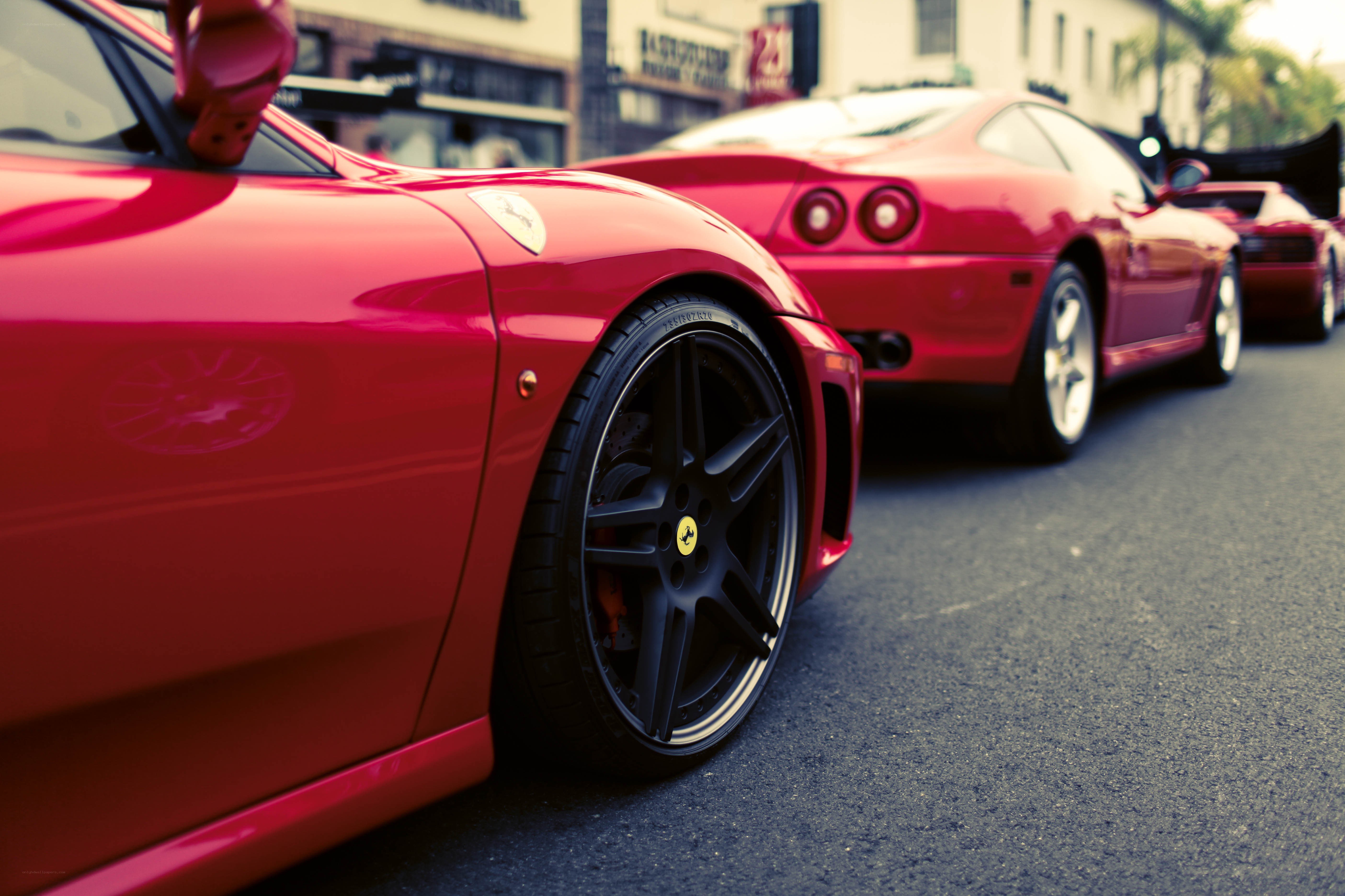 Red Ferraris in a row