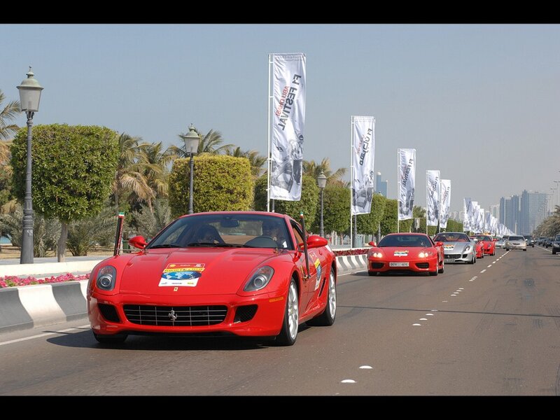 Red Ferraris on a city street
