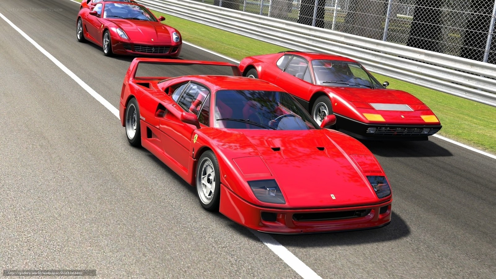 Red Ferraris on a racetrack