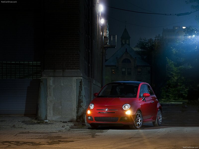 Red Fiat 500 at night