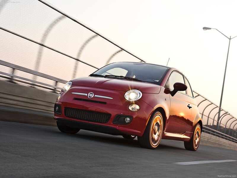 Red Fiat 500 on a bridge