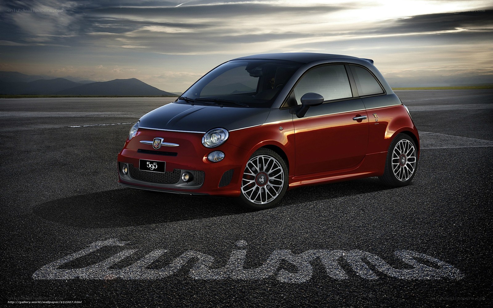 Red Fiat 500 on tarmac