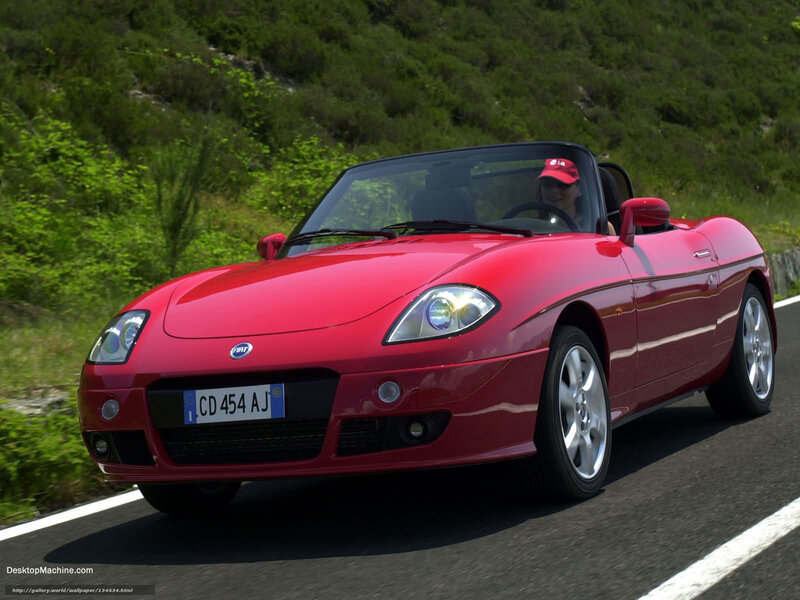 Red Fiat Barchetta on a winding road