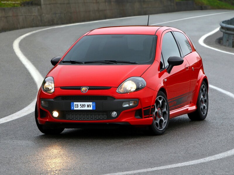 red fiat punto abarth on road