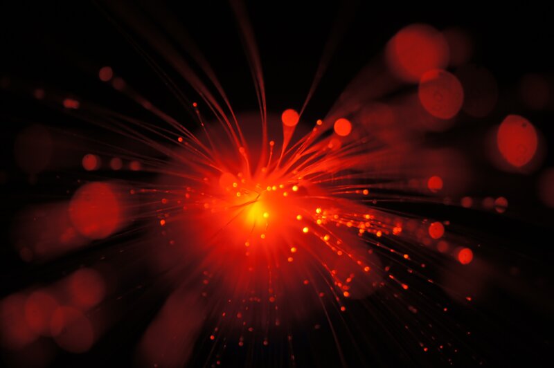 Red Fiber Optic Strands — Dramatic