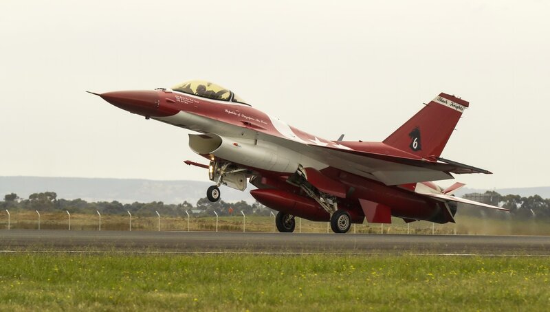 Red Fighter Jet Taking Off