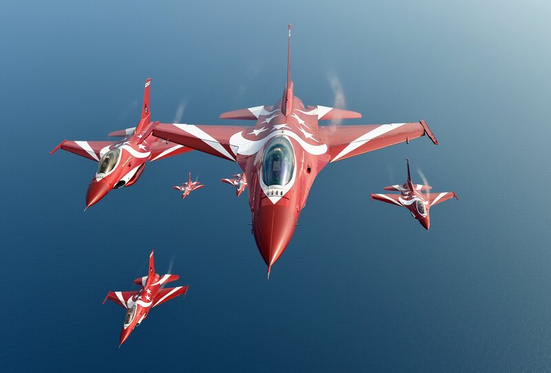 Red Fighter Jets in Formation