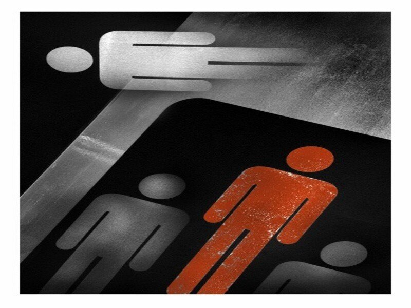 Red figure standing out from crowd
