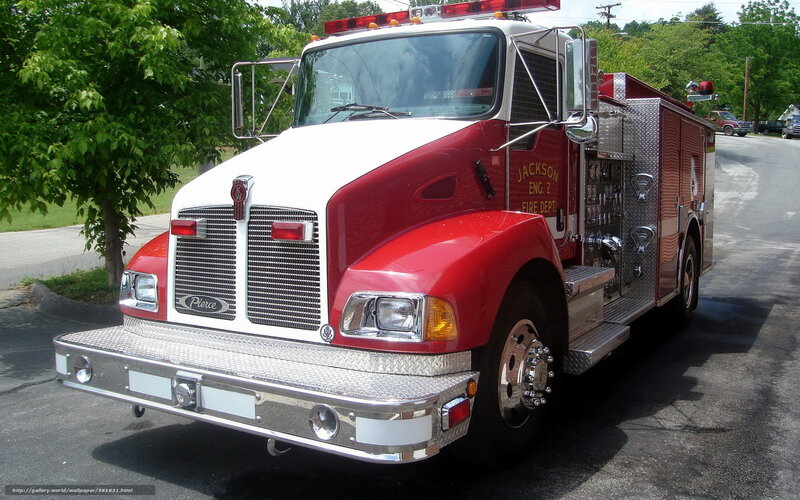 Red fire engine parked on street