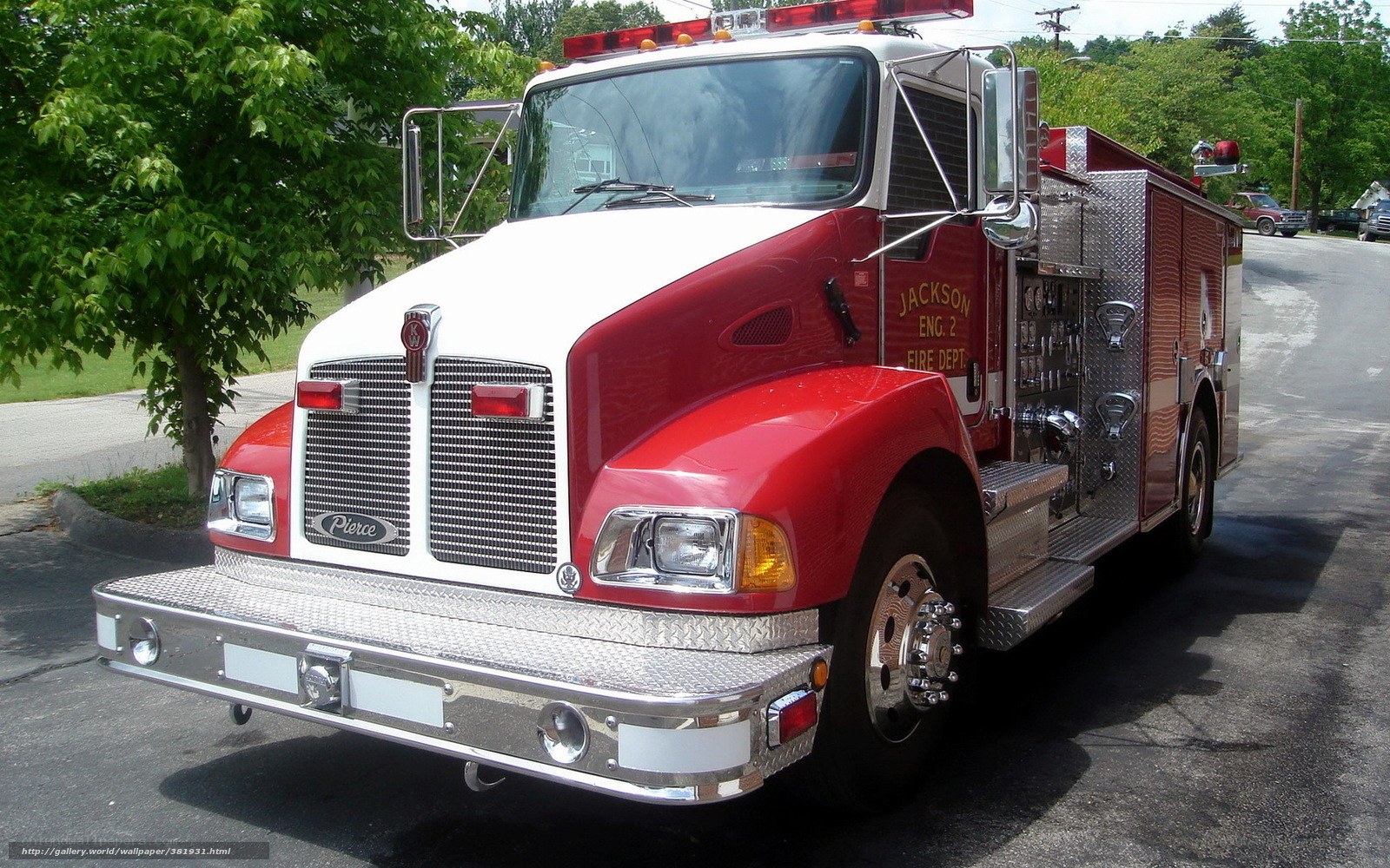Red fire engine parked on street