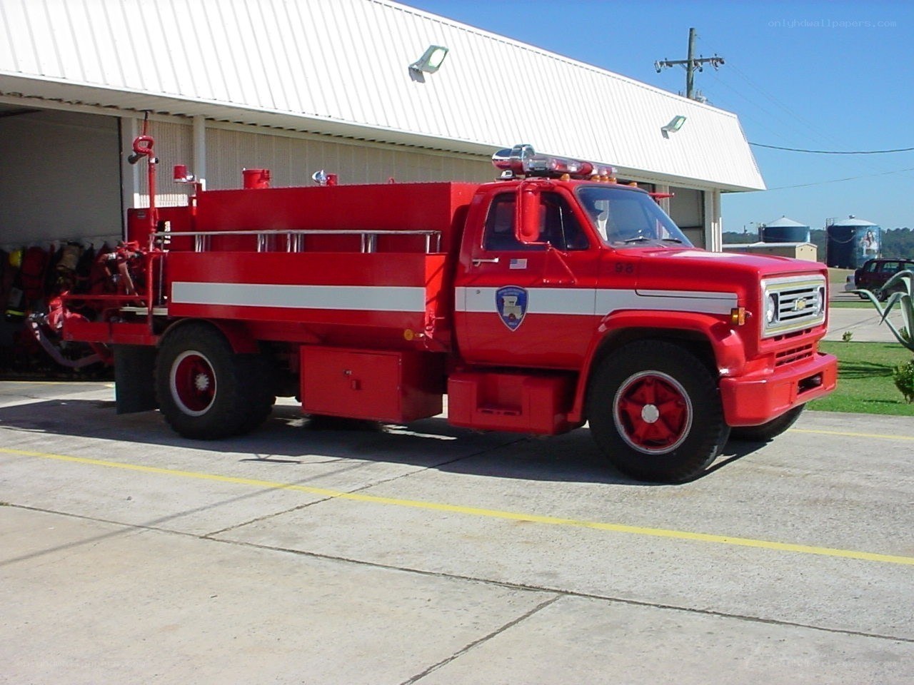 Red fire truck parked outside station