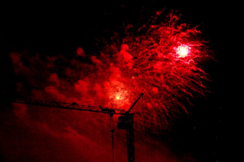 Red Fireworks Display — Dramatic, Night, Photograph, Crane