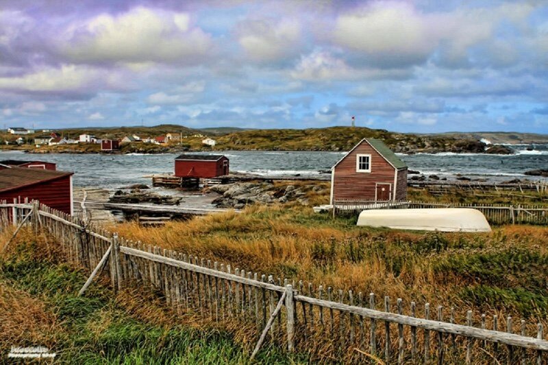 Red Fishing Huts by Sea